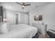 Main bedroom with a king-size bed and a dresser at 7481 Marker Ave, Kissimmee, FL 34747