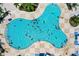 Large, freeform community pool with plenty of room for swimming and fun at 7481 Marker Ave, Kissimmee, FL 34747