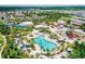 Community pool and waterpark with surrounding homes at 7481 Marker Ave, Kissimmee, FL 34747