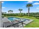 Relaxing pool area with lounge chairs and spa at 7481 Marker Ave, Kissimmee, FL 34747