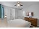 Bright bedroom with a king-size bed and ensuite bathroom at 7481 Marker Ave, Kissimmee, FL 34747
