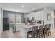 Modern kitchen with stainless steel appliances and white cabinetry at 7481 Marker Ave, Kissimmee, FL 34747