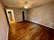 Spacious bedroom with wood-look floors at 180 Waterfall Way # 203, Altamonte Springs, FL 32714