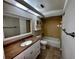 Clean bathroom with a tub, toilet and vanity at 180 Waterfall Way # 203, Altamonte Springs, FL 32714