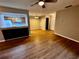 Open concept dining area with wood-look floors and kitchen access at 180 Waterfall Way # 203, Altamonte Springs, FL 32714