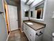 Bright bathroom with updated vanity and fixtures at 180 Waterfall Way # 203, Altamonte Springs, FL 32714