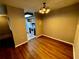 Bright dining area with wood-look floors at 180 Waterfall Way # 203, Altamonte Springs, FL 32714