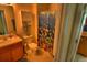 Clean bathroom with standard fixtures and a decorative shower curtain at 8516 Crystal Cove Loop, Kissimmee, FL 34747