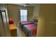 Bedroom with two twin beds and a window at 8516 Crystal Cove Loop, Kissimmee, FL 34747