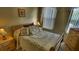 Inviting bedroom with wooden furniture and soft bedding at 8516 Crystal Cove Loop, Kissimmee, FL 34747