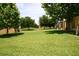 Lush green common area between townhomes at 8516 Crystal Cove Loop, Kissimmee, FL 34747