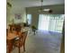 Comfortable living area with sliding glass doors leading to a patio at 8516 Crystal Cove Loop, Kissimmee, FL 34747