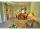 Spacious living and dining area adjacent to the kitchen and laundry at 8516 Crystal Cove Loop, Kissimmee, FL 34747
