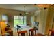 Spacious living room with sliding glass doors leading to a patio at 8516 Crystal Cove Loop, Kissimmee, FL 34747