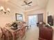 Open living and dining area with ample natural light at 1304 Seven Eagles Ct # 1304, Reunion, FL 34747