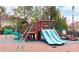 Community playground with modern play structures for  at 1304 Seven Eagles Ct # 1304, Reunion, FL 34747