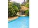 Relaxing lazy river pool with a cave waterfall at 1304 Seven Eagles Ct # 1304, Reunion, FL 34747