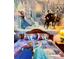 Charming bedroom with Frozen-themed bedding and mural at 1304 Seven Eagles Ct # 1304, Reunion, FL 34747