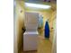Convenient laundry closet with stackable washer and dryer at 1304 Seven Eagles Ct # 1304, Reunion, FL 34747