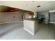 Open kitchen with stainless steel appliances and breakfast bar at 368 Fairgreen Pl, Casselberry, FL 32707
