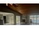Living room with vaulted ceiling, fireplace and water view at 368 Fairgreen Pl, Casselberry, FL 32707
