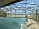 Screened-in pool with lake view at 368 Fairgreen Pl, Casselberry, FL 32707
