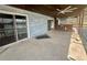 Covered patio with pool access and lake view at 368 Fairgreen Pl, Casselberry, FL 32707