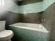 Clean bathroom with a bathtub and tile surround at 368 Fairgreen Pl, Casselberry, FL 32707