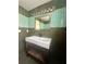 Updated bathroom with a vanity, sink, and mirror at 368 Fairgreen Pl, Casselberry, FL 32707