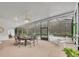 Relaxing screened-in pool area with outdoor dining space at 1709 Onondaga Dr, Geneva, FL 32732