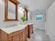 Charming bathroom with double sinks and marble countertops at 1709 Onondaga Dr, Geneva, FL 32732