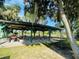 Relaxing shaded picnic pavilion with multiple tables at 1709 Onondaga Dr, Geneva, FL 32732