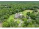 House with pool and large lot surrounded by trees at 1709 Onondaga Dr, Geneva, FL 32732