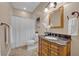 Well-appointed bathroom with granite vanity and shower at 1709 Onondaga Dr, Geneva, FL 32732
