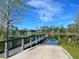 Lakefront dock with gazebo and boardwalk at 1709 Onondaga Dr, Geneva, FL 32732