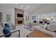 Open living area with brick fireplace and high ceiling at 1709 Onondaga Dr, Geneva, FL 32732