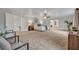 Spacious main bedroom with sliding barn doors to the en-suite bathroom at 1709 Onondaga Dr, Geneva, FL 32732