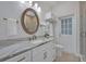 Elegant bathroom with quartz vanity and walk-in shower at 1709 Onondaga Dr, Geneva, FL 32732