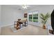 Bright home office with large window and built-in shelving at 1709 Onondaga Dr, Geneva, FL 32732