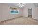Bright bedroom with ample closet space and neutral carpeting at 1709 Onondaga Dr, Geneva, FL 32732