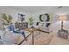 Living area with sofa, chairs and coffee table at 1709 Onondaga Dr, Geneva, FL 32732