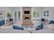 Spacious living room with fireplace and seating at 1709 Onondaga Dr, Geneva, FL 32732