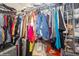 Walk-in closet with ample hanging space and shelving at 218 Hillcrest Dr, Davenport, FL 33897