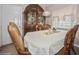 Formal dining room with wood table and hutch at 218 Hillcrest Dr, Davenport, FL 33897