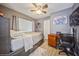 Bright bedroom with a double bed, desk, and ample closet space at 218 Hillcrest Dr, Davenport, FL 33897