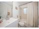 Clean bathroom with a bathtub, shower, and updated vanity at 218 Hillcrest Dr, Davenport, FL 33897