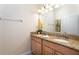 Double vanity bathroom with granite countertop at 8951 Bismarck Palm Rd, Kissimmee, FL 34747