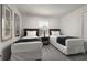 Bedroom with two twin beds and window at 8951 Bismarck Palm Rd, Kissimmee, FL 34747