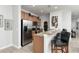 Well-equipped kitchen featuring stainless steel appliances and ample cabinetry at 8951 Bismarck Palm Rd, Kissimmee, FL 34747