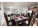 Bright dining room with a large table, perfect for Gathering gatherings at 8951 Bismarck Palm Rd, Kissimmee, FL 34747